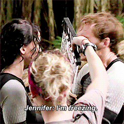 Behind the scenes of Catching Fire, after they got out of the water, Jen was freezing, so Sam rubbed her arms to try to warm her up, haha!