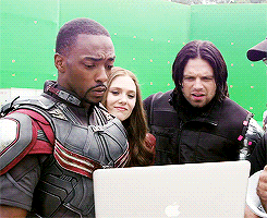 Bucky got frazzled by new tech,  Wanda the unimpressed teenager, and Falcon probs just messing with Bucky. 'And this button makes you download pizza,' 'no way'