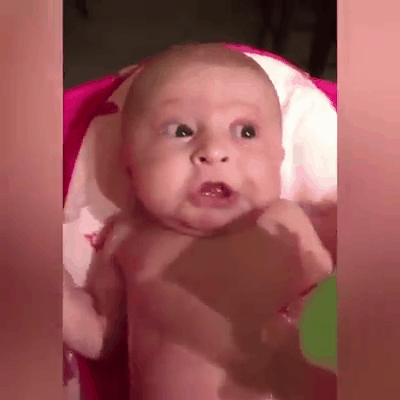 Facial expression when bathing baby