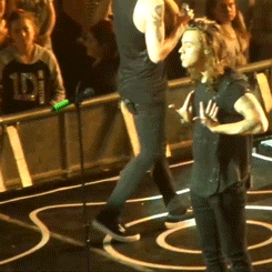 Harry after Liam sprayed him with water. LOL - OTRA Tour - 10/8/15