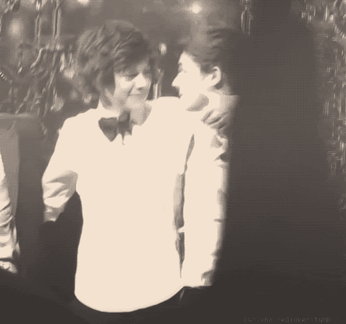 Harry and Louis 2012. (One thumbs up is half of the sign for 