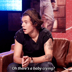 harry's face lighting up like the morning sun when he hears a baby in the room (gif
