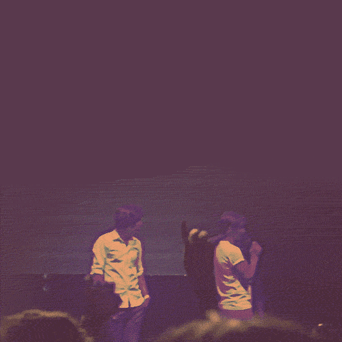 he grabs him by the back of the neck. omg. If you love Larry follow me on twitter @loveinleeds