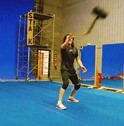 I have absolutely no idea why I find the combo Hiddles+Loki wig+sneakers+hammer amazing, but I do (gif