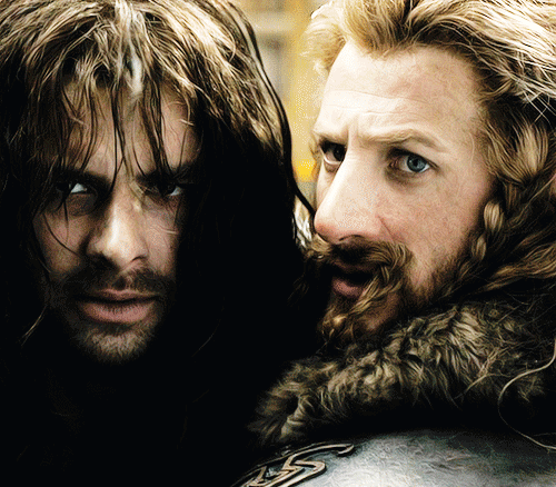 I see two sides of the story here. The look they give Thorin. It hurts so much to look at it. Thorin was practically their father, and you can only imagine how much he loved them, but he is so consumed with his quest that he doesn't care how much it hurts Kili to leave him behind. However, there is the other side that says  he is simply loving Kili by making him stay behind, seeing how ill he is, and Fili is being a loyal brother and foolish youth. What do you all think? <- Exactly the same!