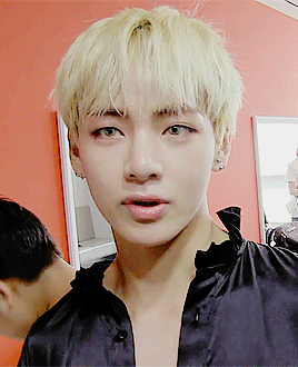 Kim TaeHyung gorgeous with blonde hair and those contacts BTS