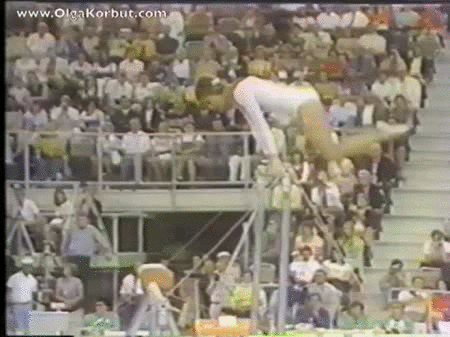 Look at the back flip over the lower bar and back onto the high bar! | The Coolest Move They Got Rid Of In Olympic Gymnastics