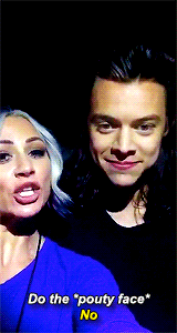 Lou Teasdale trying to get Harry to do duck face on her snapchat and him refusing. LOL