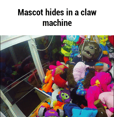 Mascot hides in a claw machine GIF