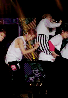 So Jimin is smacking JungKook's hand off his butt while he's touching Suga's butt