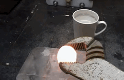 This hot nickel ball piercing through a block of ice: | 24 Oddly Satisfying GIFs Of Random Objects Being Destroyed