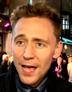 Tom Hiddleston's expression when he wants to answer a question without saying a spoiler
