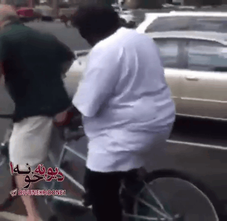 Big fat man riding a bicycle. He ruined the bike