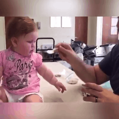 dad and daughter eat yogurt