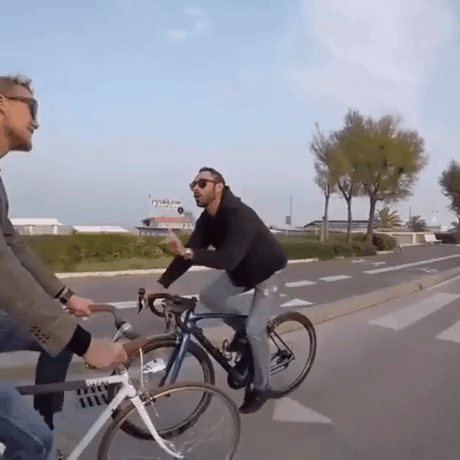 men riding bicycles