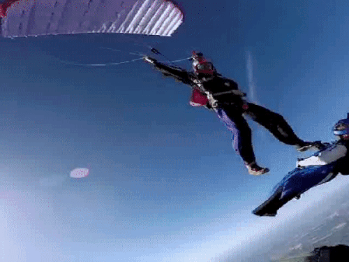 Paratroopers on the back of two people fly