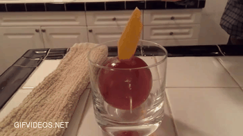 A cocktail INSIDE of an ice ball